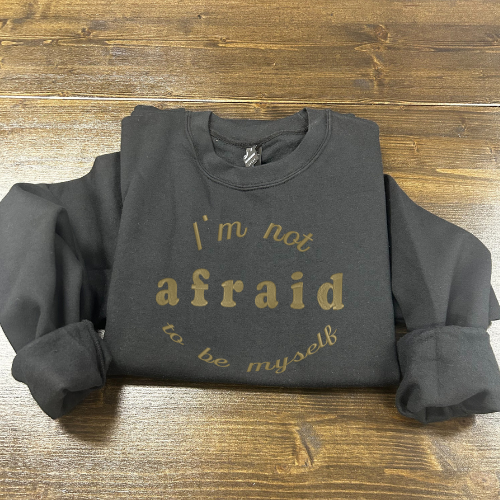 Džemperis su siuvinėtu užrašu " I'm not afraid to be myself"