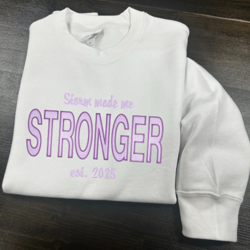 Siuvinėtas džemperis su užrašu "Storm made me Stronger"