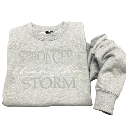 Siuvinėtas džemperis "Stronger then the storm"