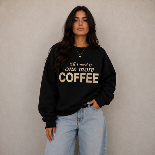 Sweatshirt with embroidered inscription "All I need is one more coffee"