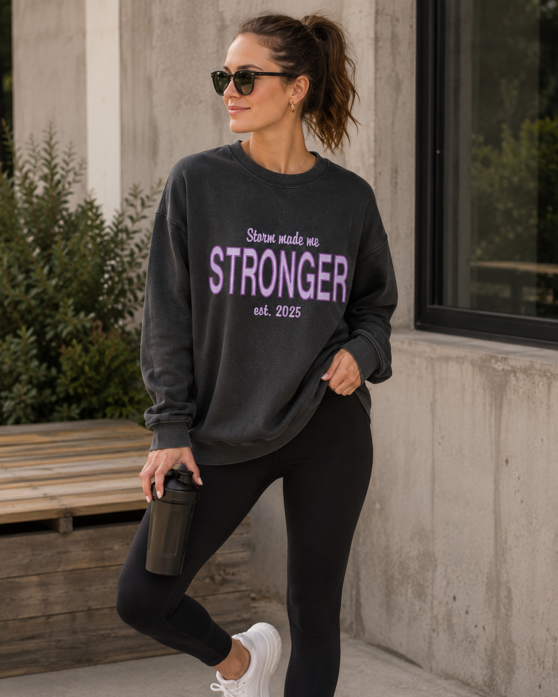 Embroidered sweatshirt with the inscription "Storm made me Stronger"